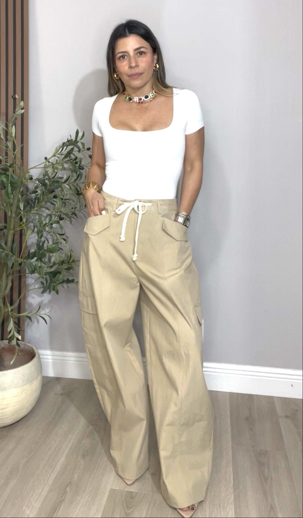 Chic Casual Style with White Bodysuit and Beige Cargo Pants - 31915